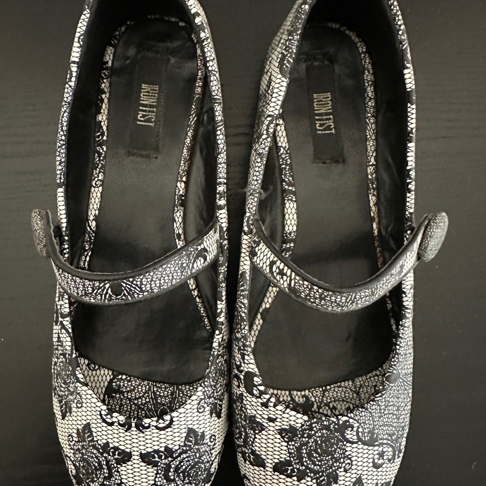 Iron Fist Black and White Flats with Skull and Crossbones with Roses Design